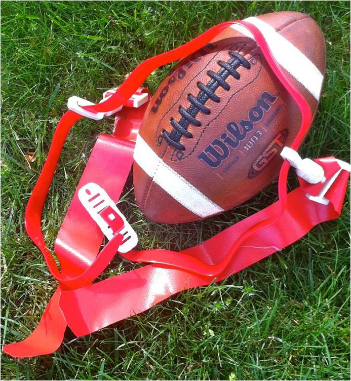 Kids playing youth football in Macomb